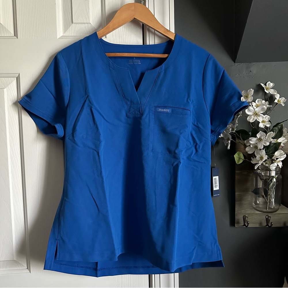 Jaanuu Women’s 1 Pocket Tuck-In Scrub Top in Royal Blue